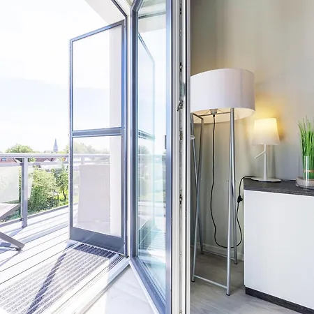 아파트 Boddenperle - 5-sterne-ferienwohnung Mit Ostbalkon, 2 Baedern & Strandhaus-charme